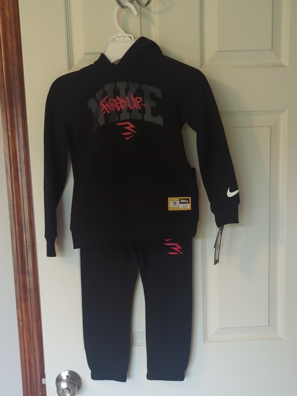 Nike Black Kids Hoodie and Jogger Set with Red Accents